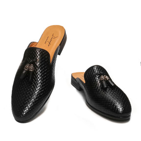 Mule informal sin cordones con detalle de borlas 